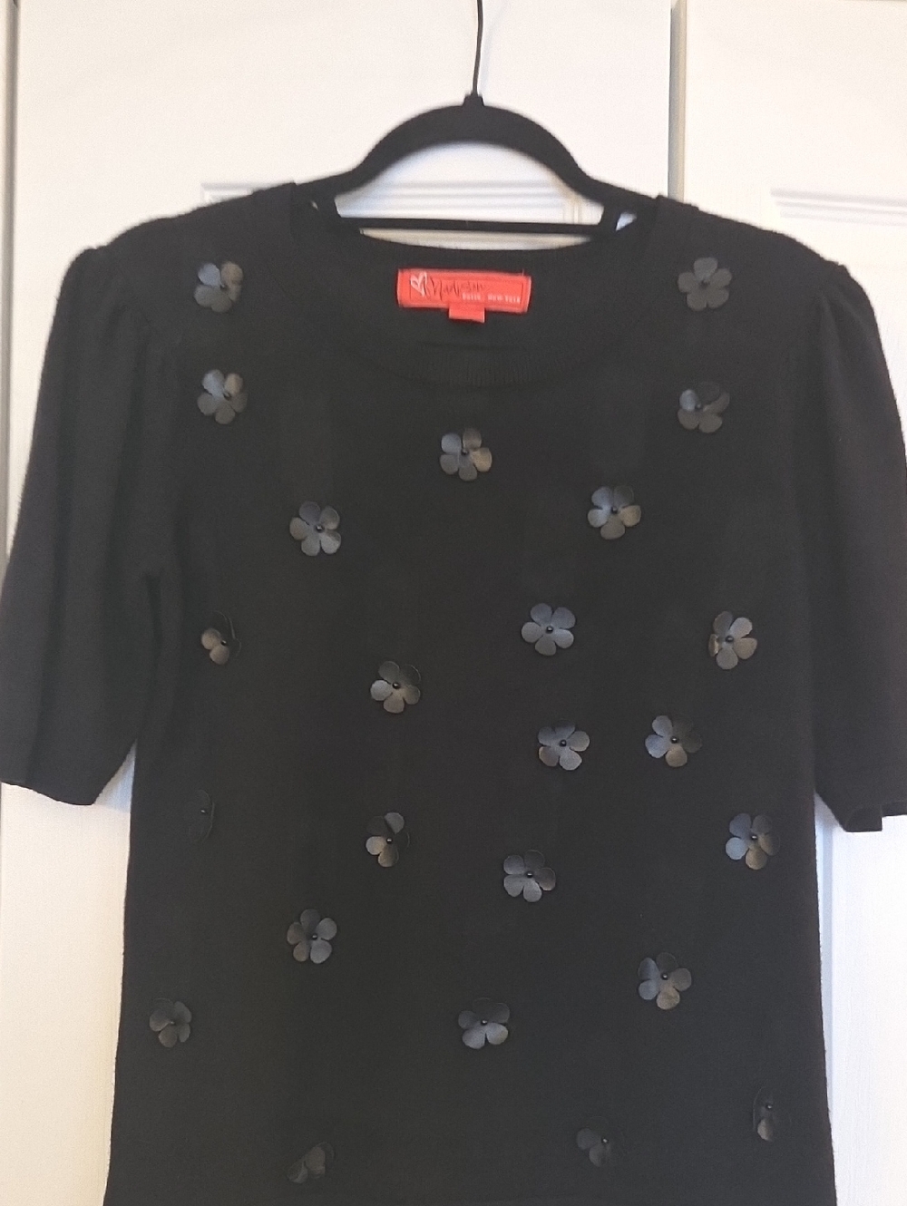 Madison Black Sweater with Orange Label Detail